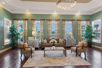 clubhouse lounge area with windows